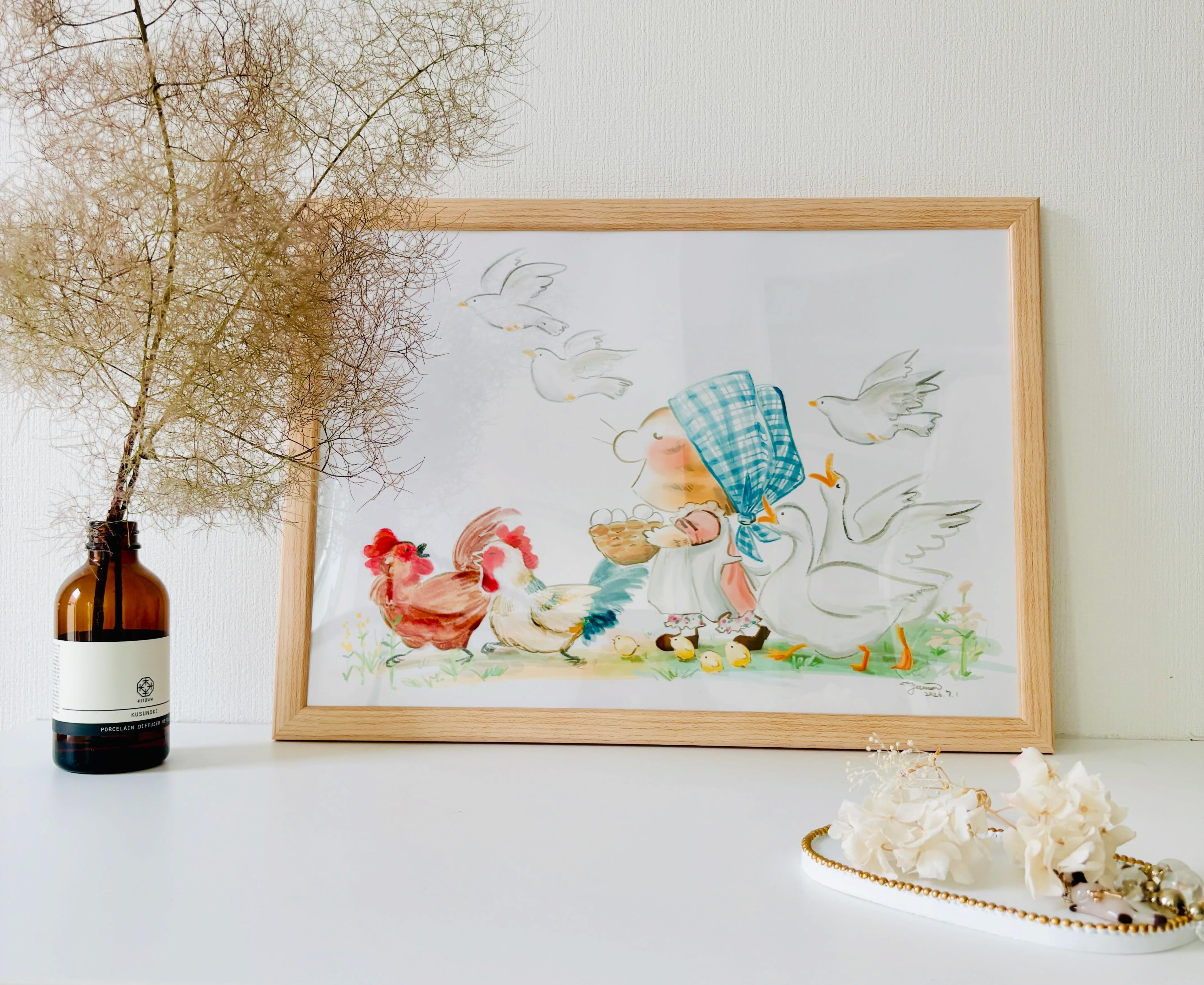 額装された展示作品「ぼくのパパは、じまんのパティシエ！」